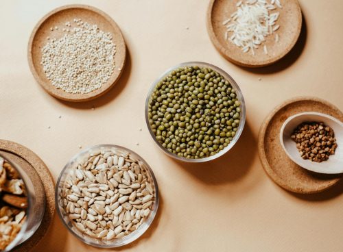 Grains and Seeds in Glass Jars and on Saucers