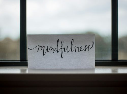 mindfulness printed paper near window