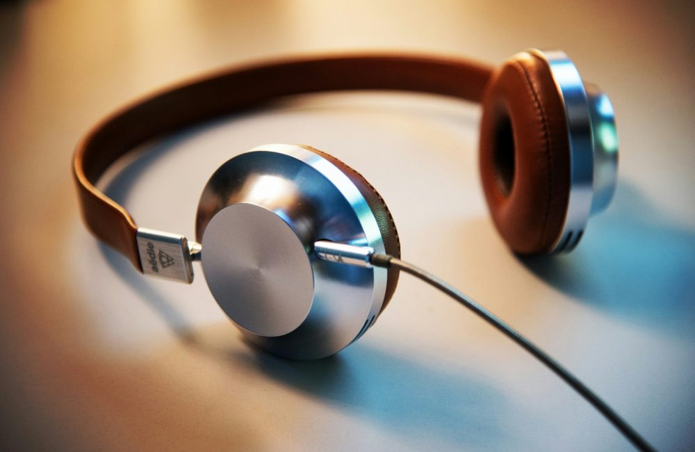 gray and brown corded headphones