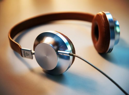 gray and brown corded headphones