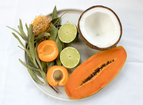 sliced fruits served on white plate
