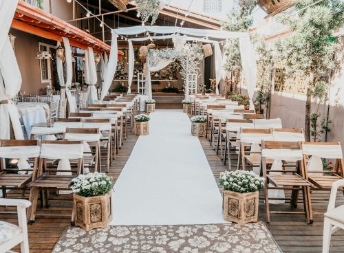 white and brown wooden tables and chairs
