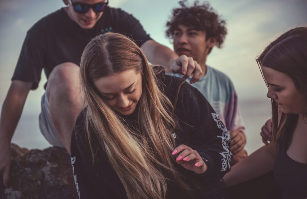 woman wears black jacket