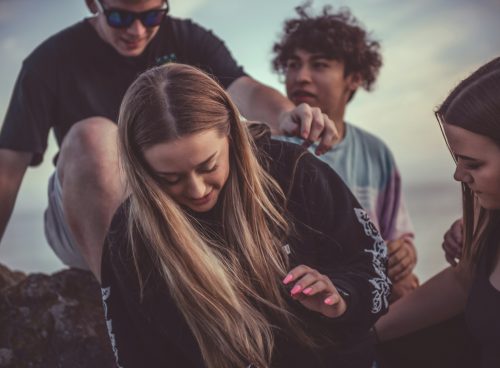 woman wears black jacket