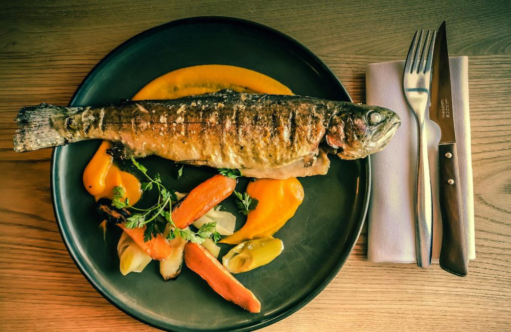 fish dish on blue ceramic plate