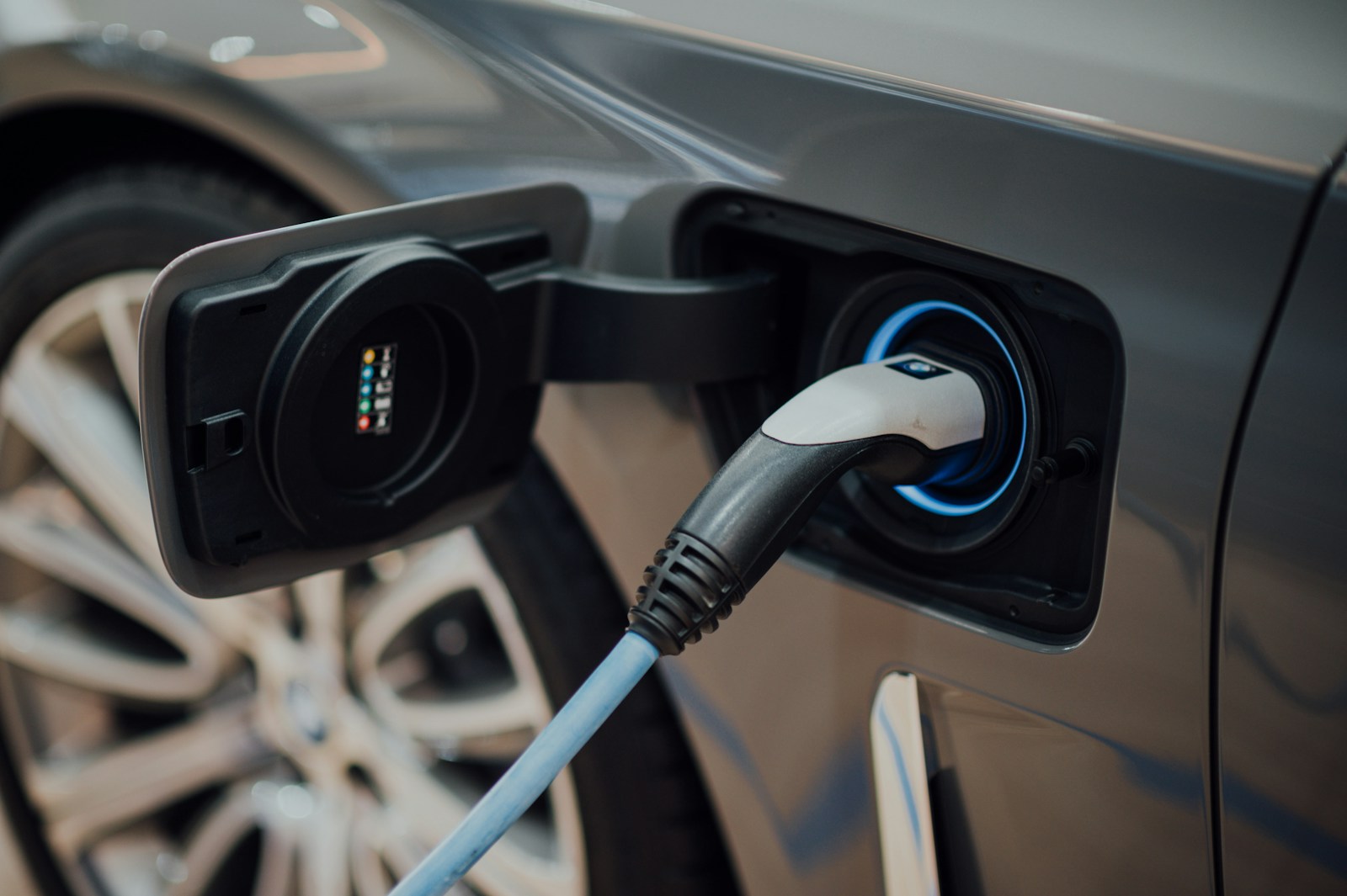 10 Reasons Why You Should Choose an Electric Vehicle (EV) for Your Next Vehicle 1 black and white usb cable plugged in black device