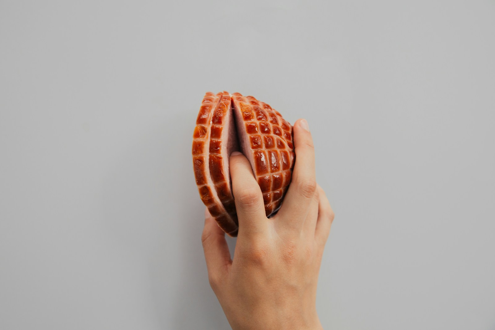 The impact of pornography on sexual health and expectations 1 person holding meat