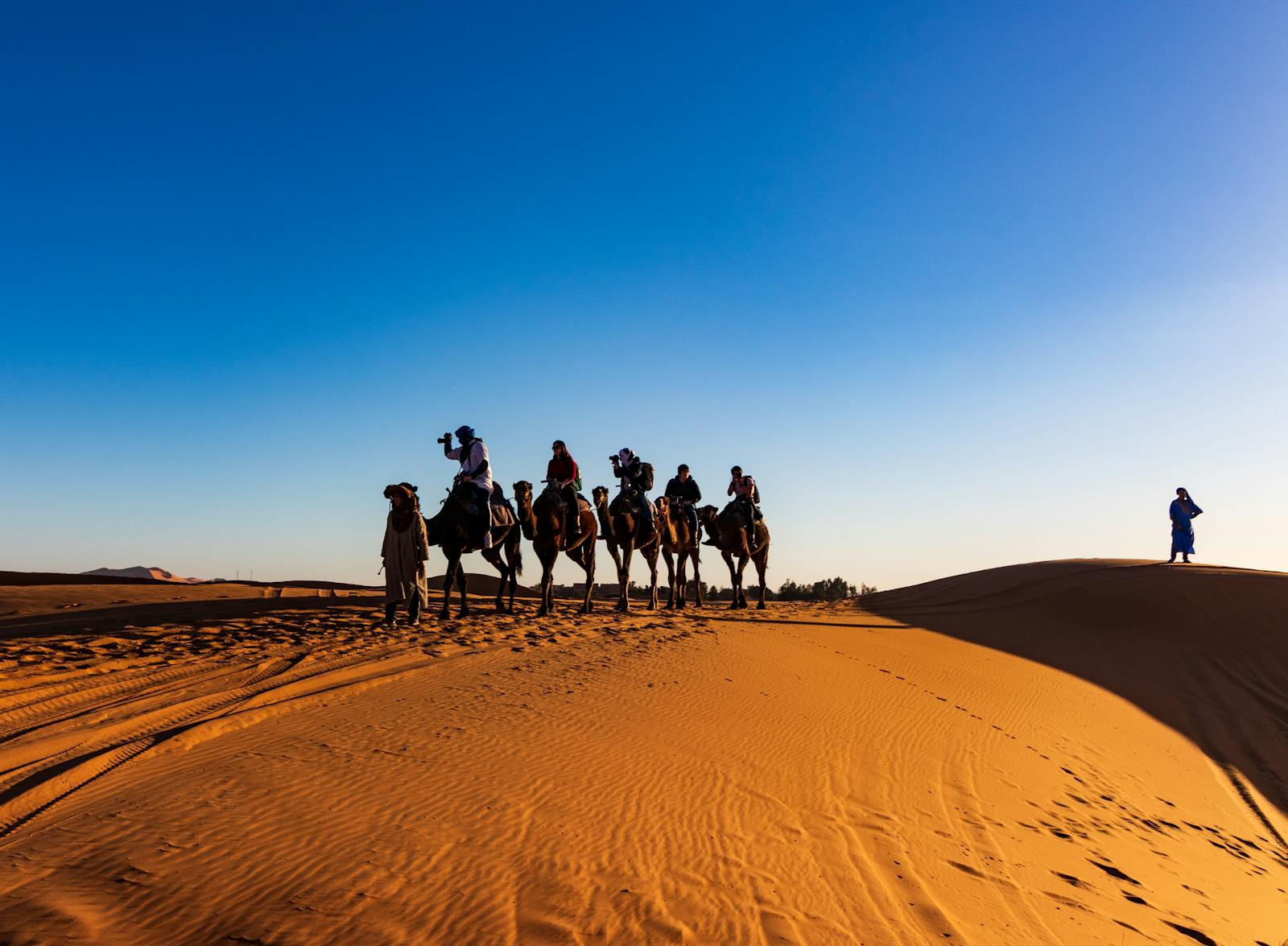 10 Best Places to Visit for Camel Caravans 1 People Riding on Camels
