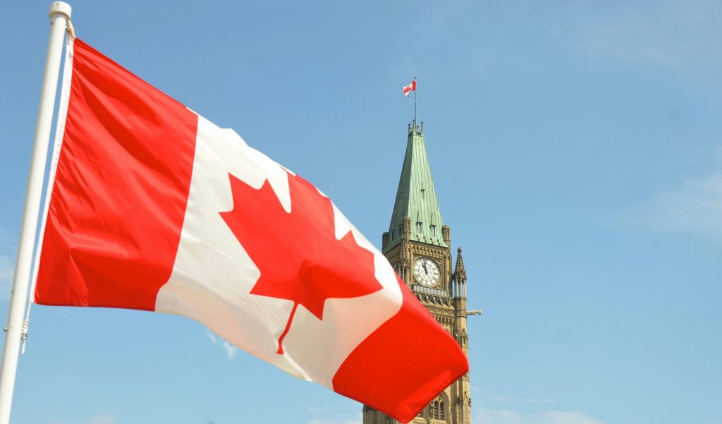 How did Canadians come to be known as Canucks?