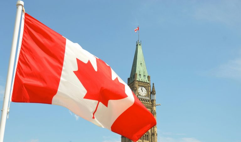 How did Canadians come to be known as Canucks?