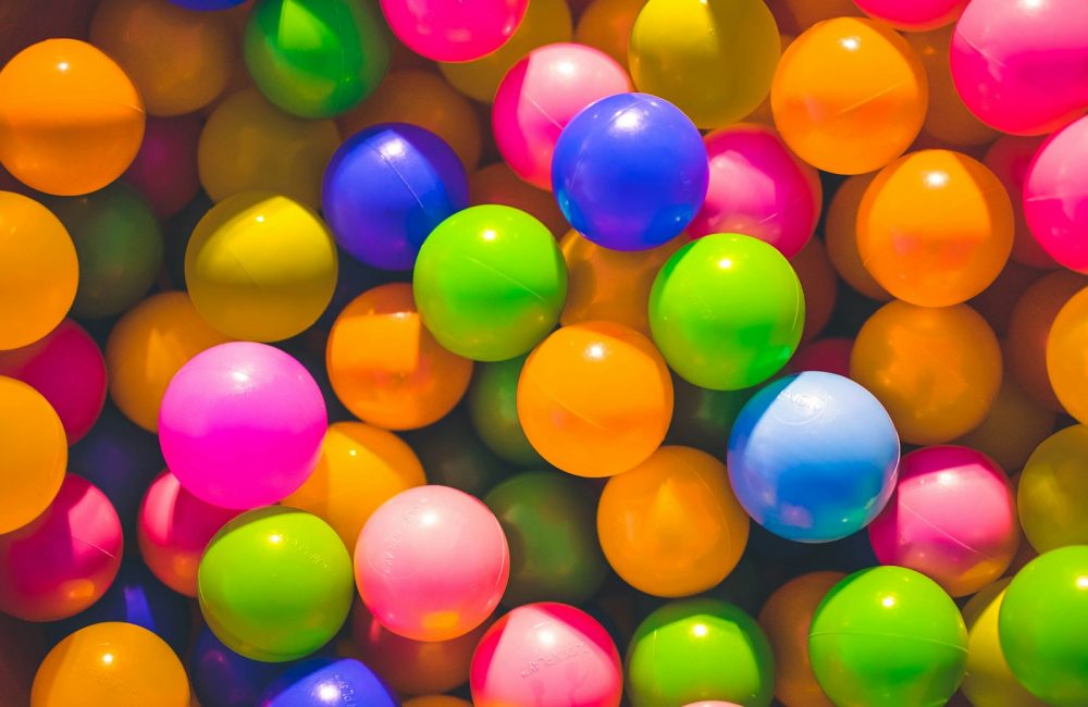high angle photo of assorted-color plastic balls