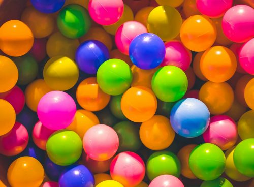 high angle photo of assorted-color plastic balls