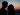 silhouette of man and woman about to kiss on beach during sunset