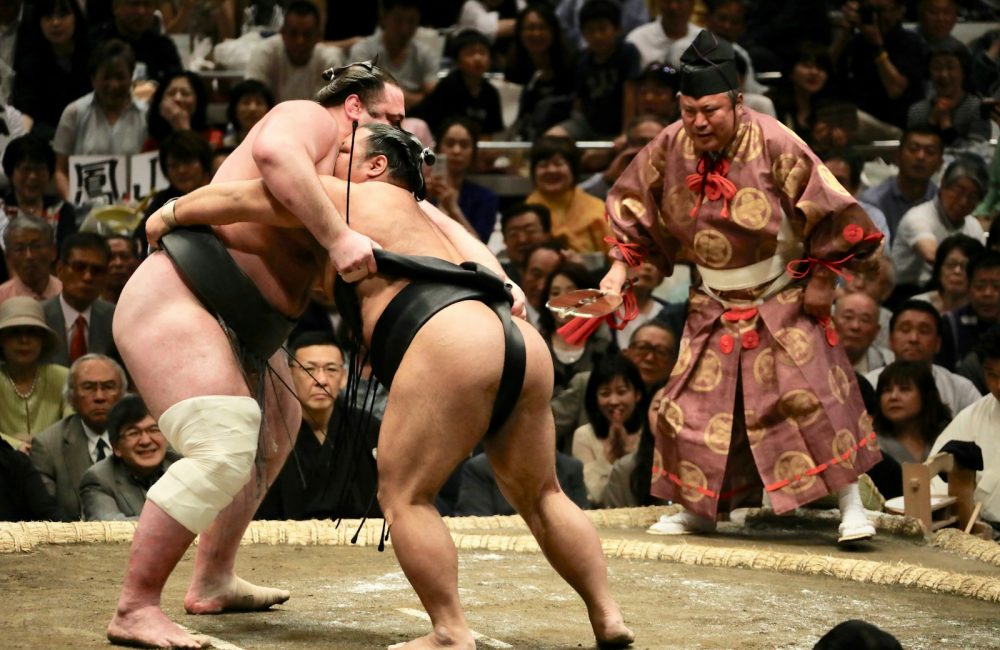 two men in sumo wrestling