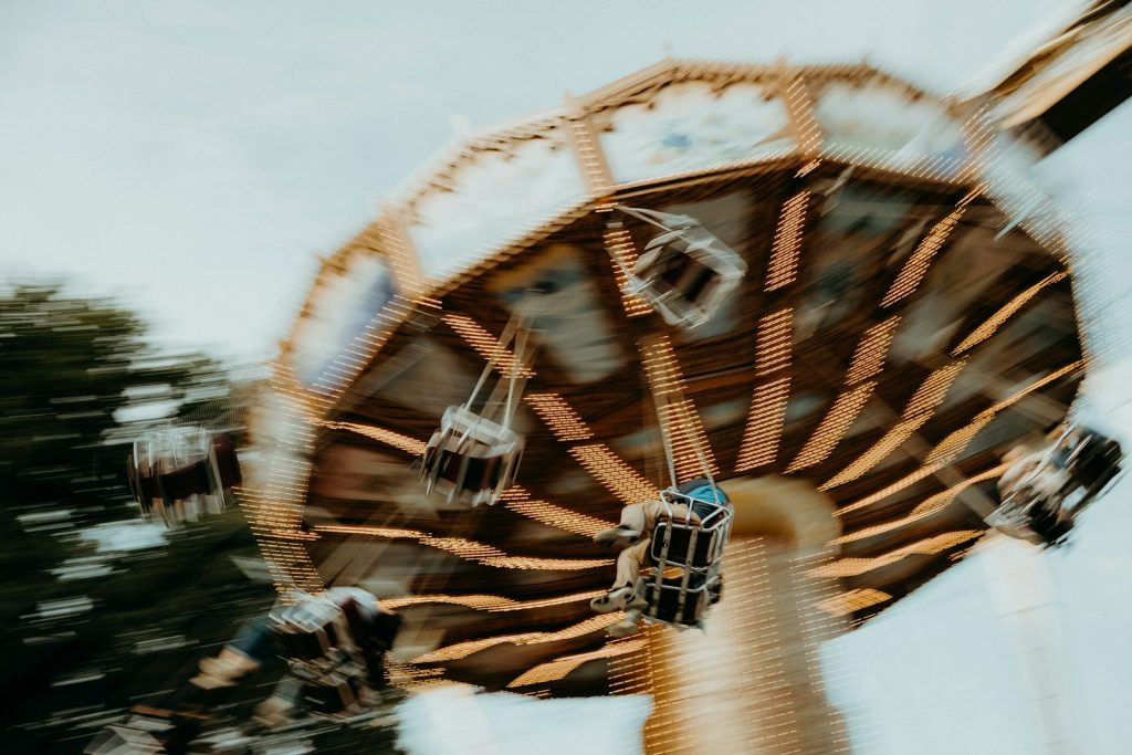 14 Best Places to Visit for Theme Parks 14 low angel photo of spinning ride