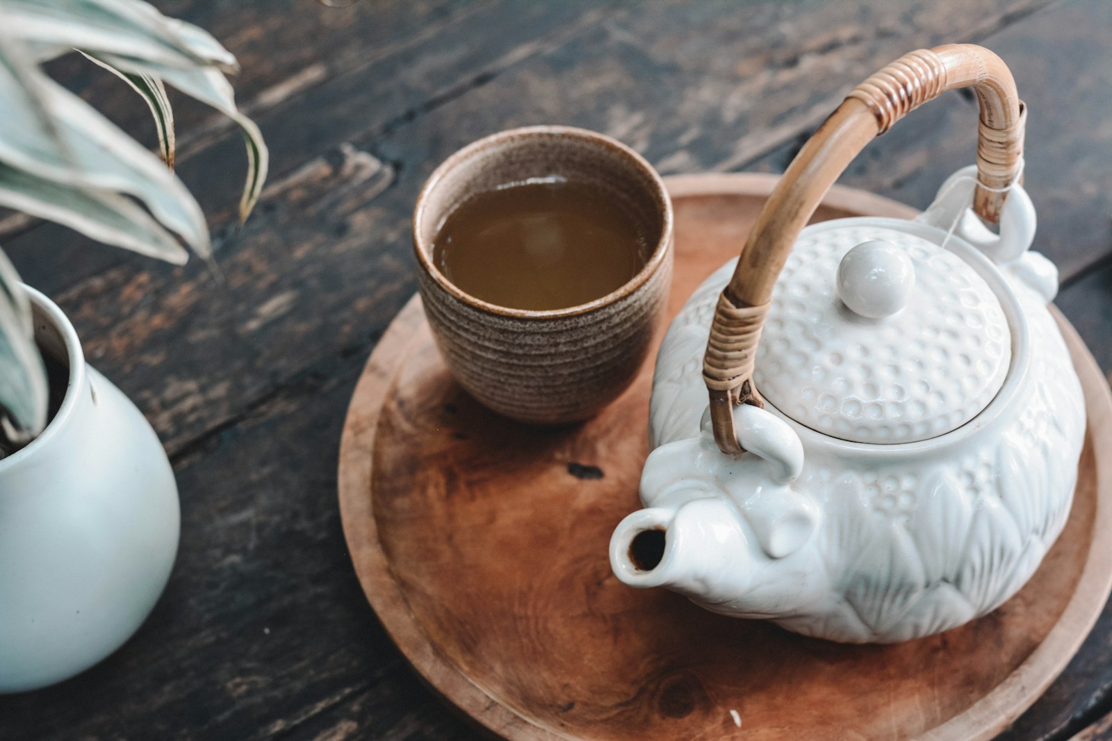 15 Best Teas for Enhancing Focus and Concentration during Work or Study 1 white and brown ceramic teapot on wooden tray