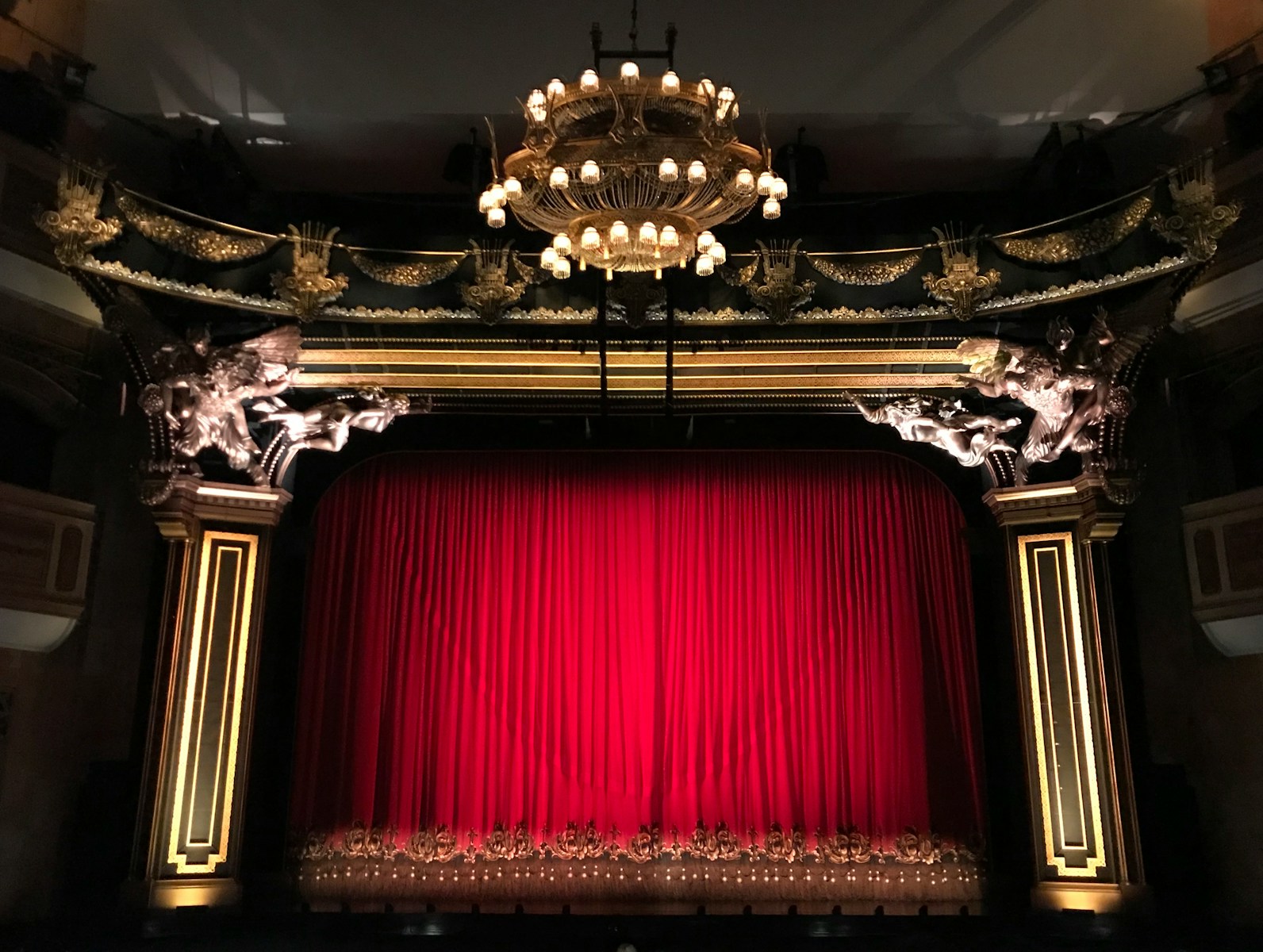 14 Best Places to Visit for Theater Enthusiasts 1 red curtain stage