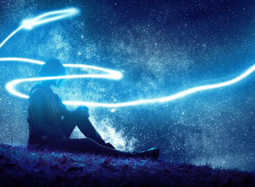 person seated on grass