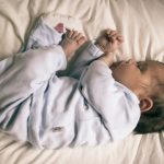 Why Babies Smile in Their Sleep: The Science Behind It