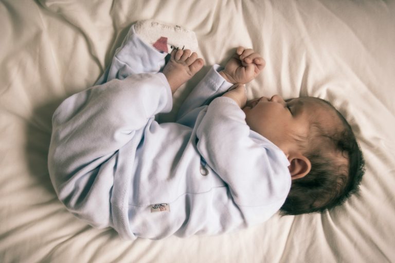 Why Babies Smile in Their Sleep: The Science Behind It