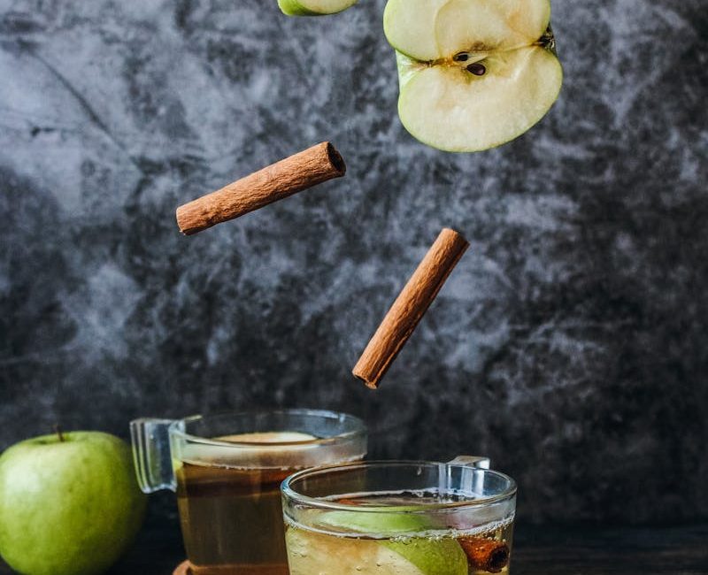 Photo of Slice Green Apple and Cinnamon Stick