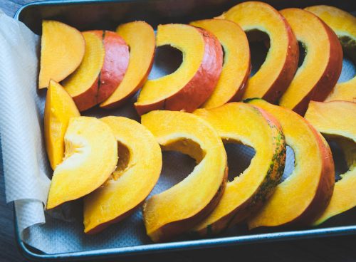 sliced fruit on black tray
