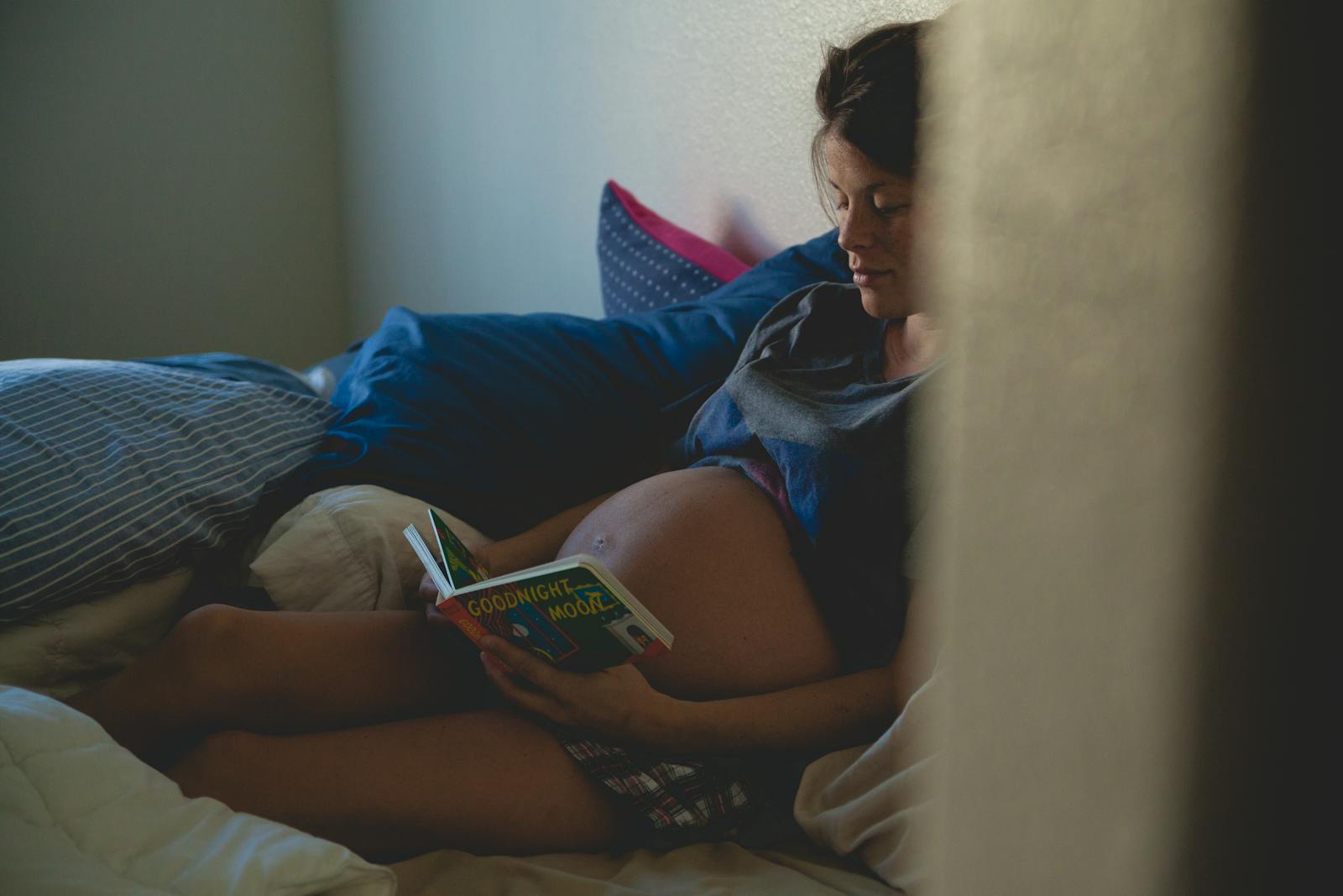 How hormonal changes during pregnancy influence sexual desire and activity 1 Pregnant Woman Sitting on Bed and Reading Book