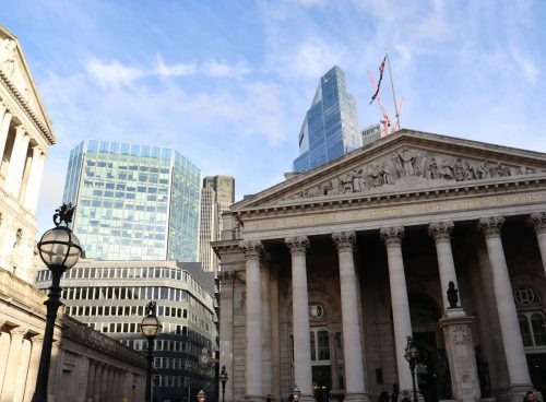 a building with columns and a flag