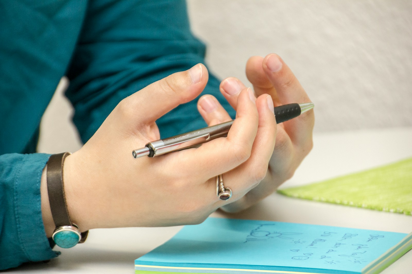 What's the difference between a financial advisor and a financial planner? 1 a person sitting at a table using a cell phone