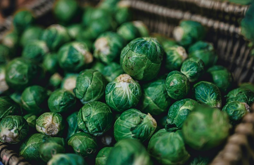 green leaves on brown woven basket