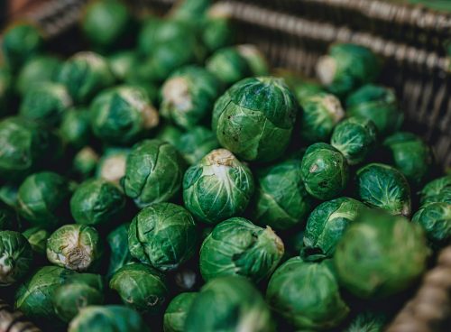 green leaves on brown woven basket