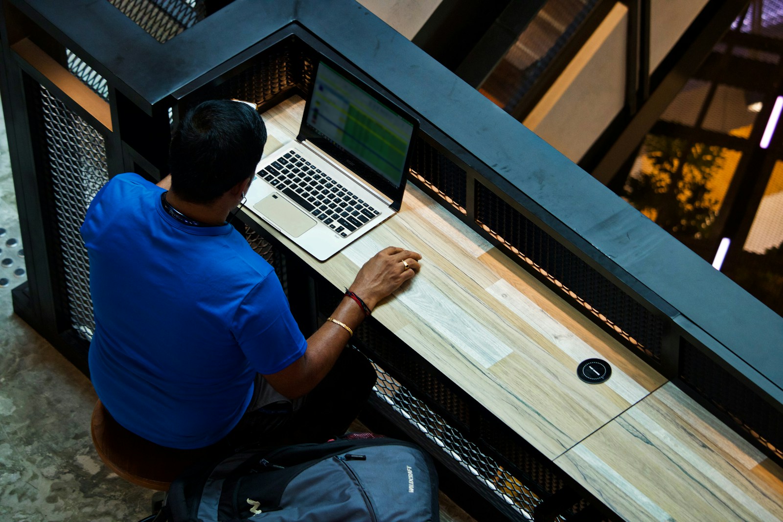 What's the difference between bookkeeping and accounting? 1 man using laptop on desk