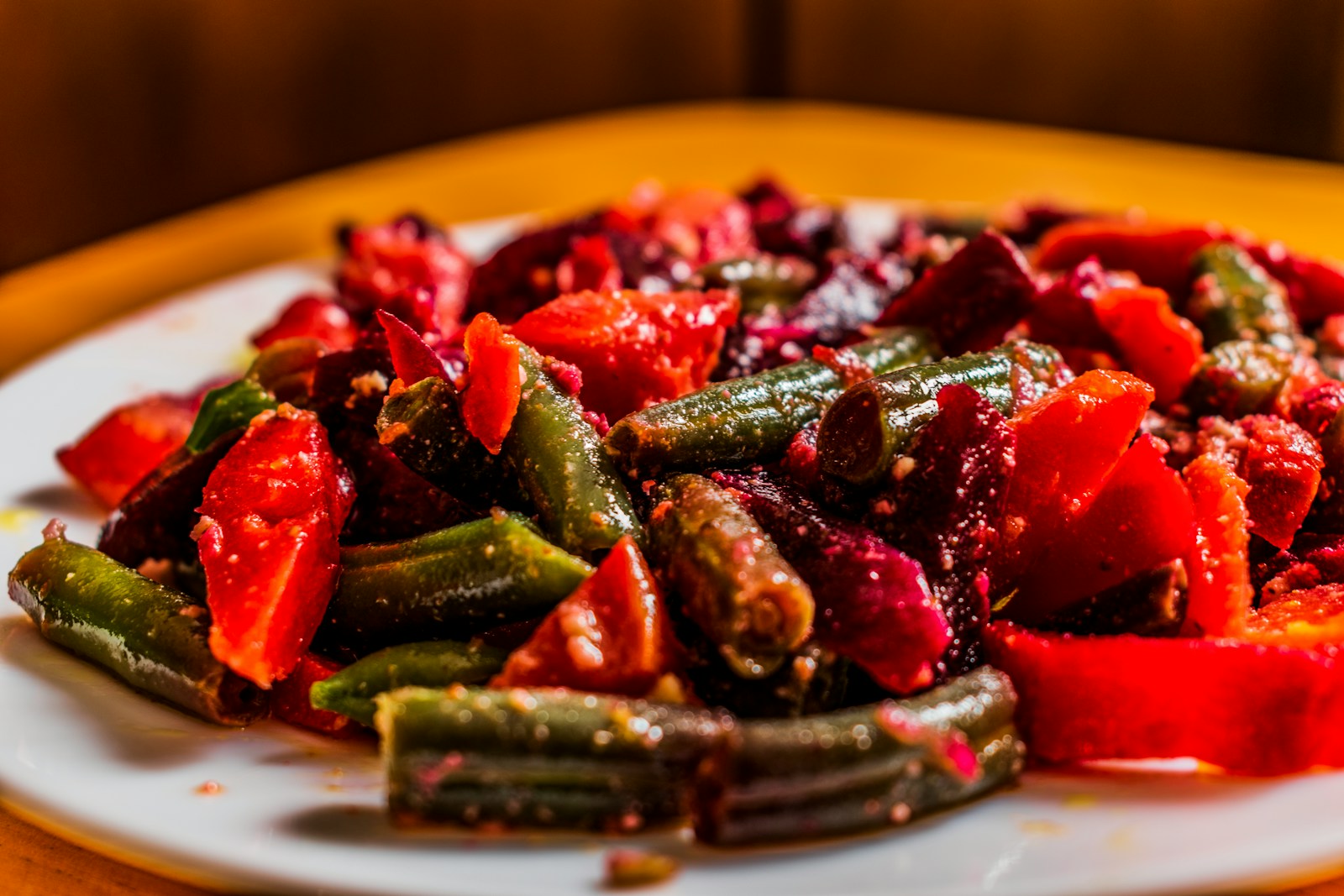 a white plate topped with sliced up vegetables