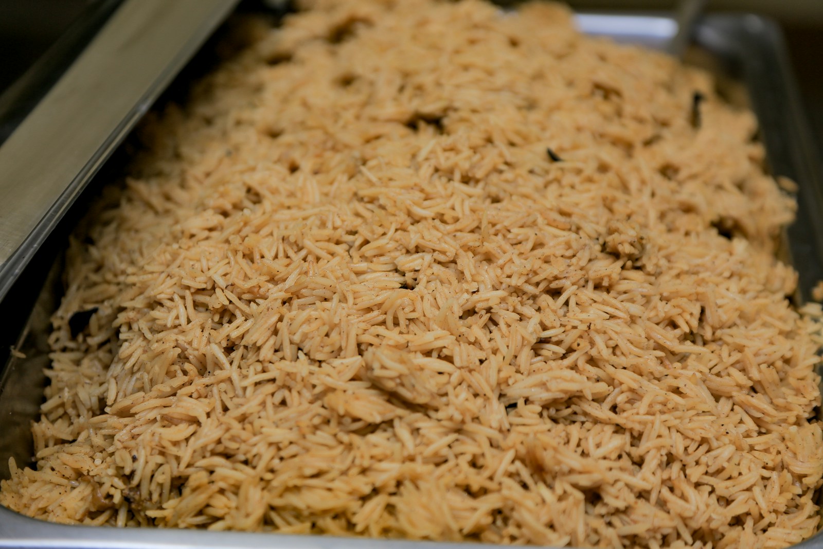 a close up of a tray of rice