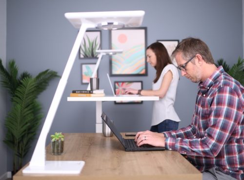 man in white crew neck t-shirt using black laptop computer
