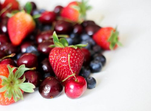 Close-Up Photography of Strawberries And Cherries