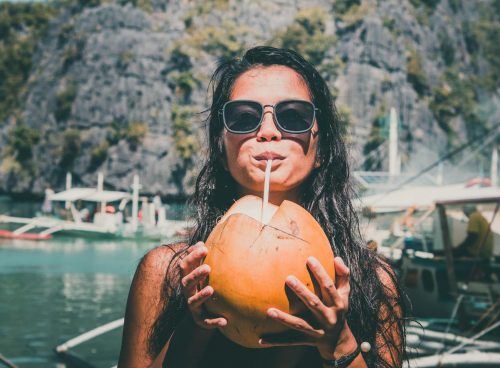 Photo of Girl Drinking Coconut