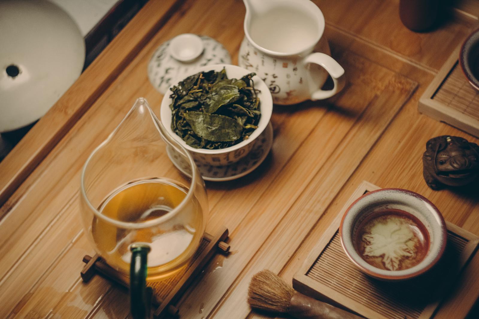 13 Best Teas for Liver Health and Detoxification 1 White Ceramic Teapot Beside Cup With Leaves