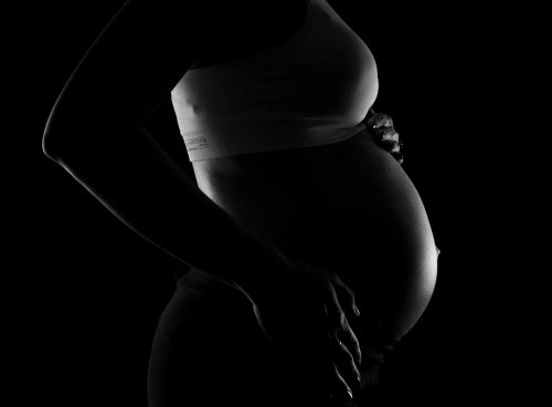 Gray scale Photo of a Pregnant Woman