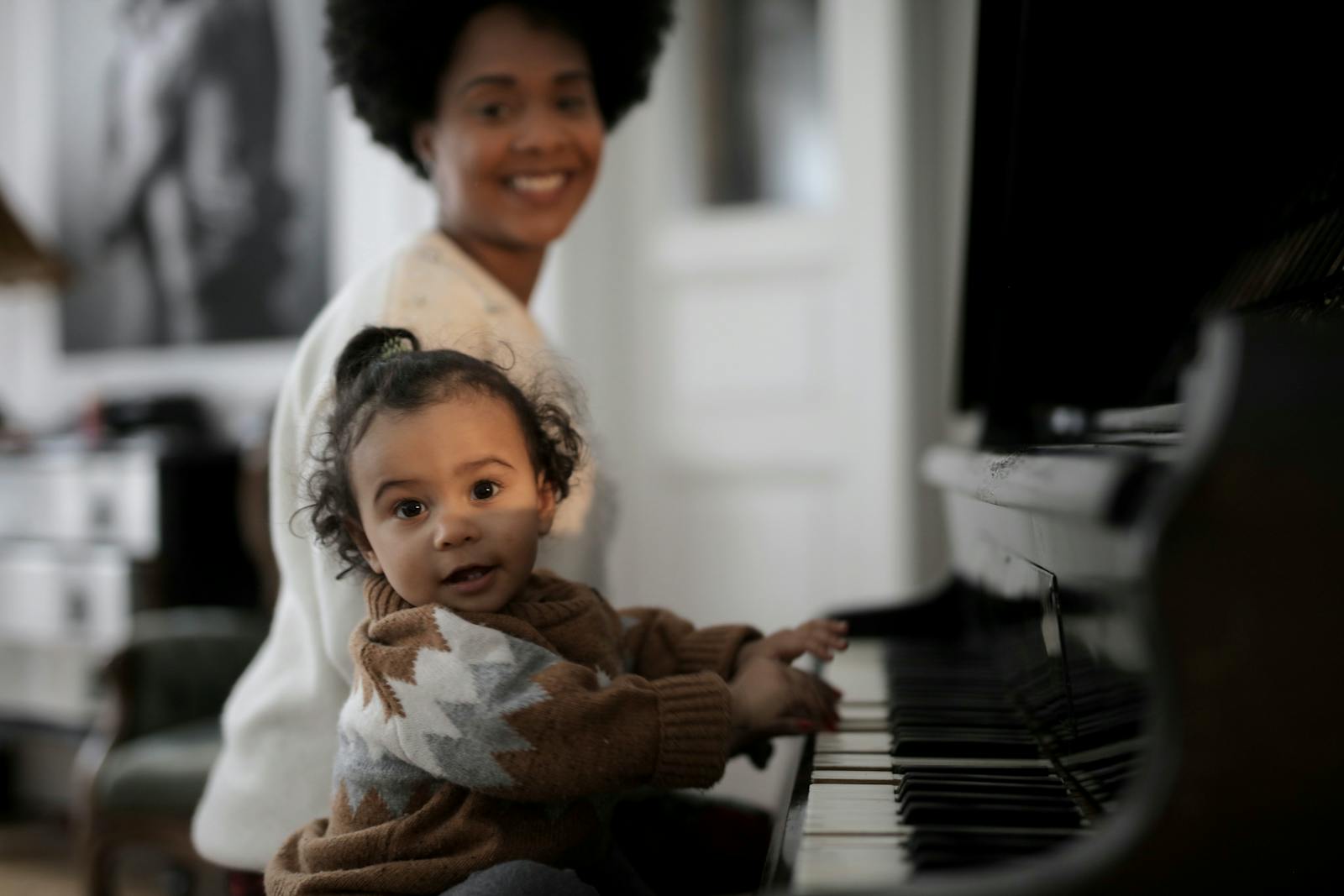 How to Inspire Your Child's Love for Art and Music Today 1 Photo of Toddler Playing Piano
