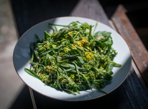 green vegetable on white ceramic plate