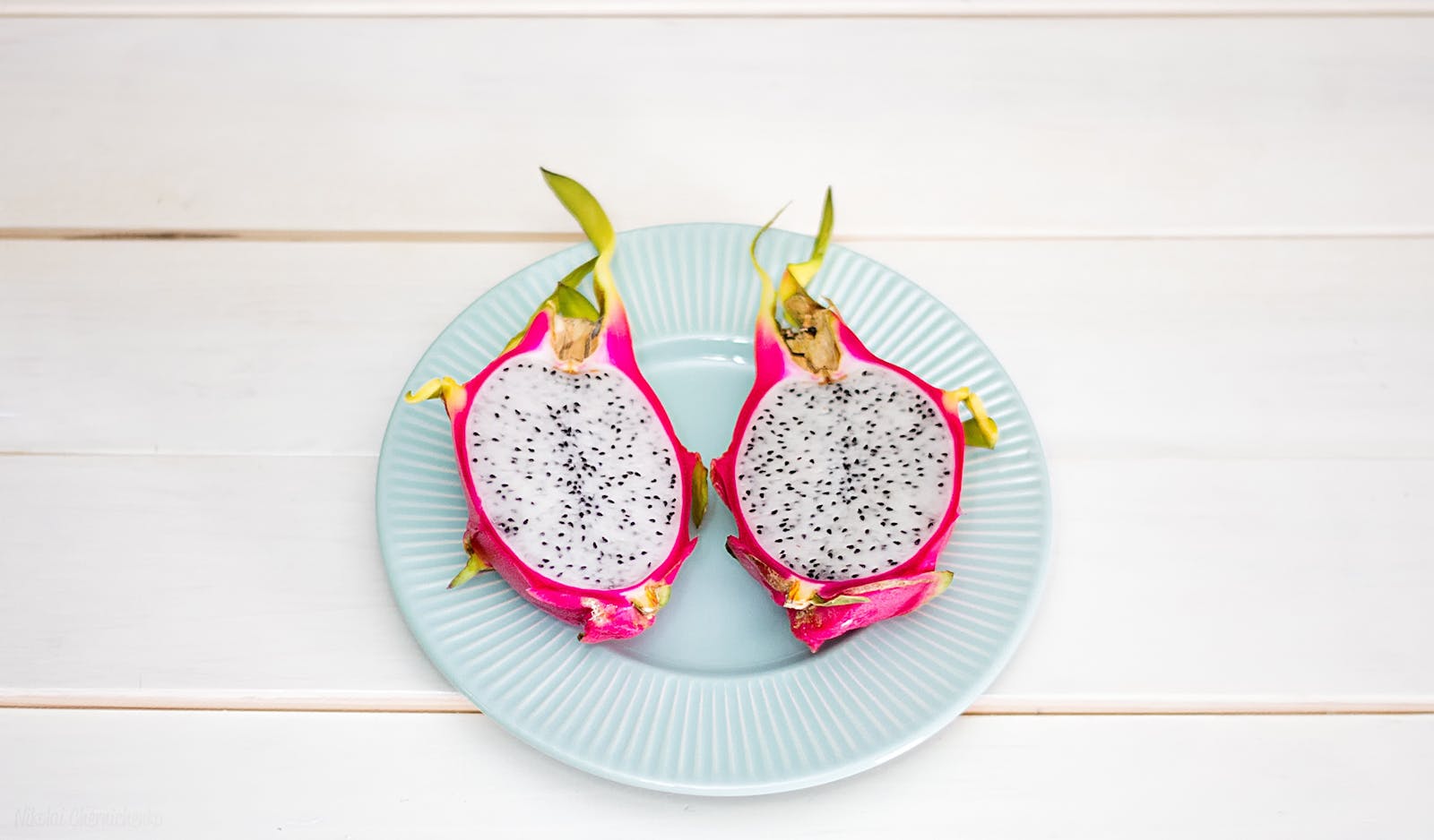 Sliced Dragon Fruit on Ceramic Plate