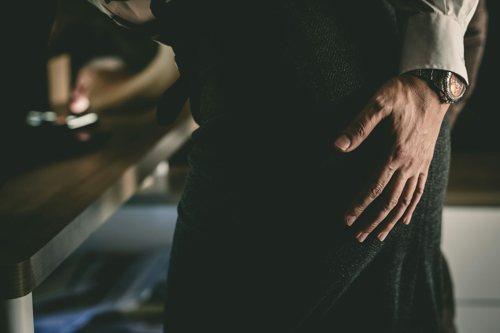 a person with their hands on their hips