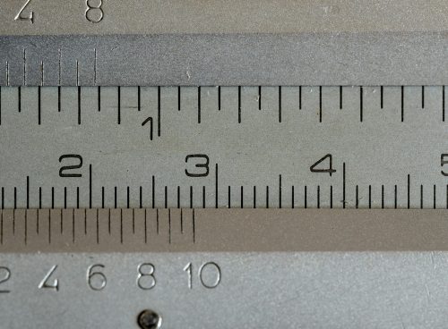 a close up of a measuring tape with numbers on it