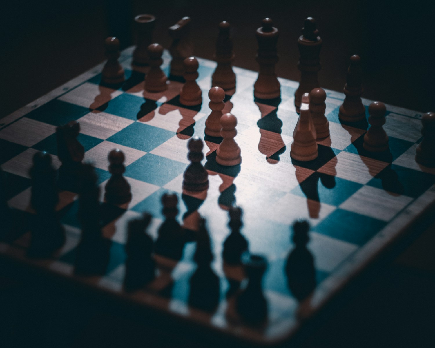 a chess board with a lot of chess pieces on it