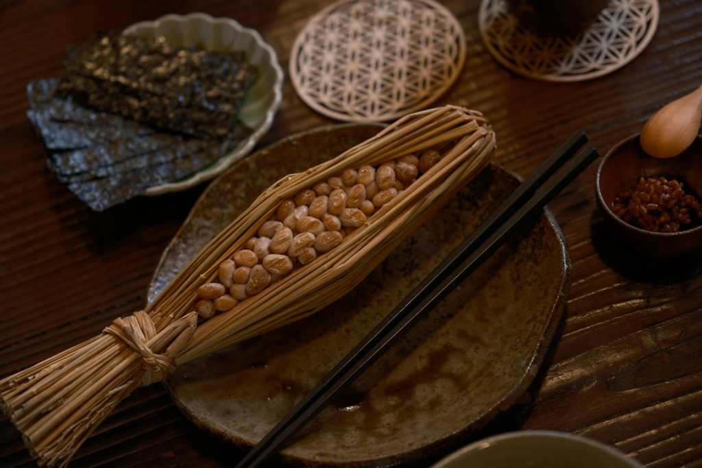 15 Exotic Food Options that Strengthen Bones and Combat Osteoporosis 2 a wooden table topped with plates and bowls filled with food