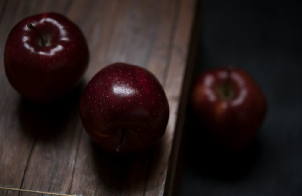 three red delicious apples