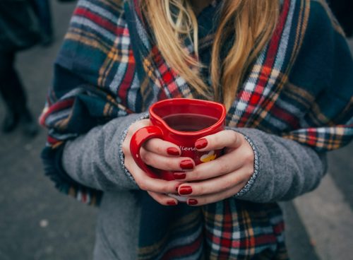 woman holding a mug