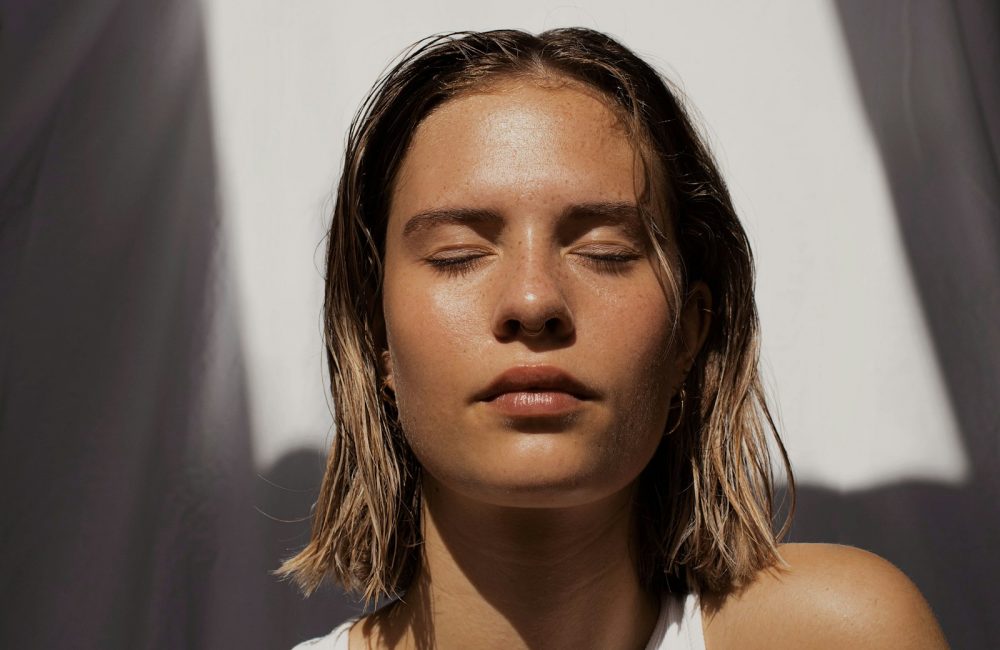 woman in white tank top