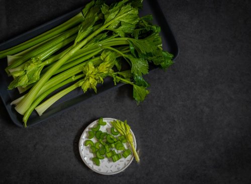 a bunch of celery sitting on top of a table
